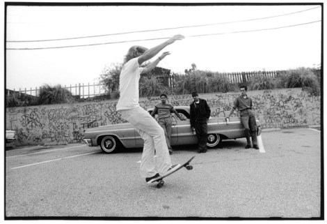 [neighborhood style slowed from the streets to the ocean and back to the streets via skateboard]