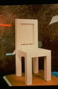 [the musical chair where the crank turned the drum to produce sound, designed by michael pinkus and The Professor, 1987]